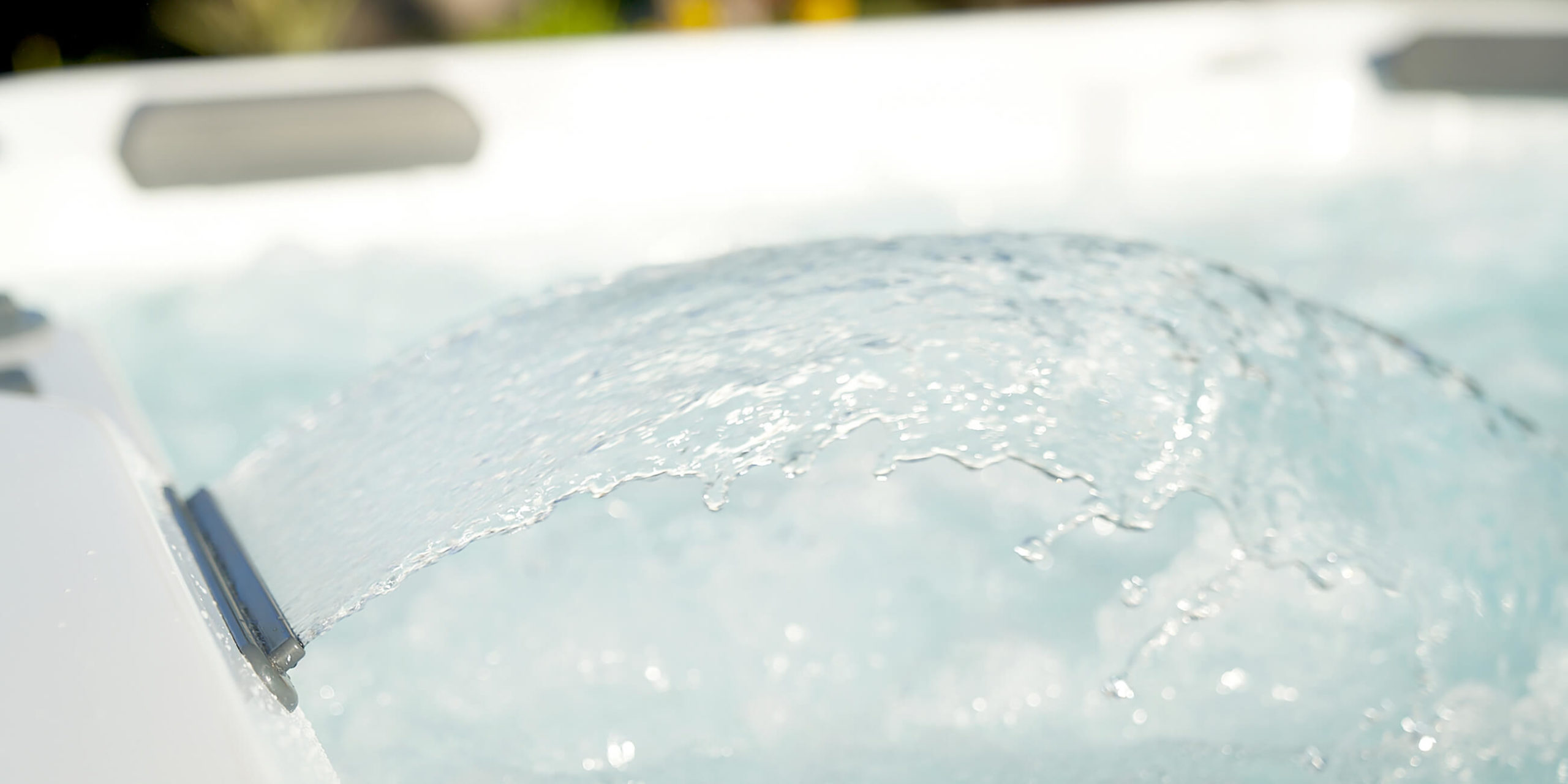 hot-spring-spas-hot-spot-collection-page-cspot-lifestyle-waterfall-feature-scaled