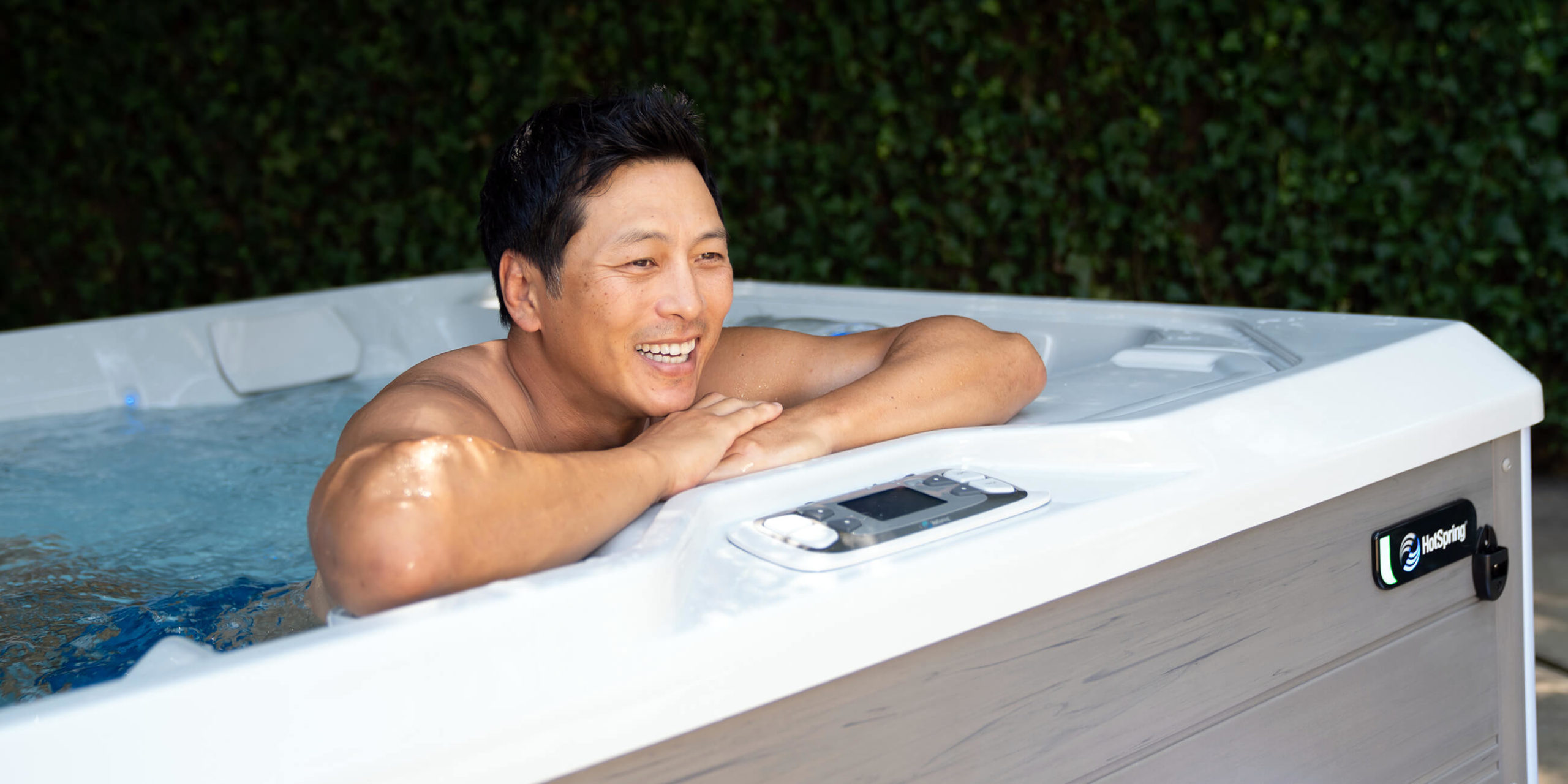 hot-spring-spas-limelight-collection-page-cspot-lifestyle-man-in-spa-scaled